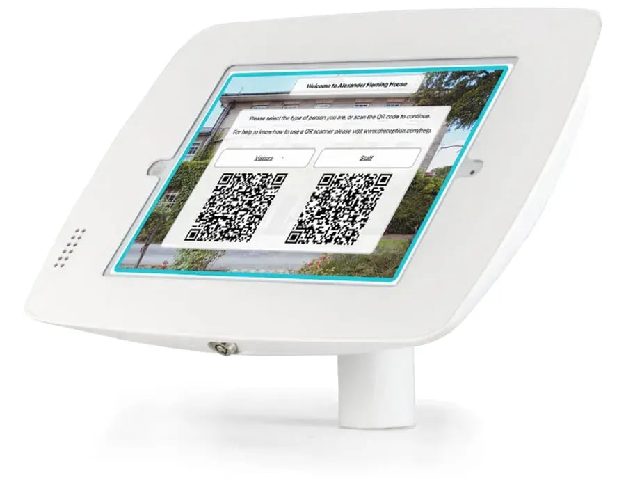 The Digital Reception sign-in screen on a tablet in a reception stand, showing QR codes for visitors and staff