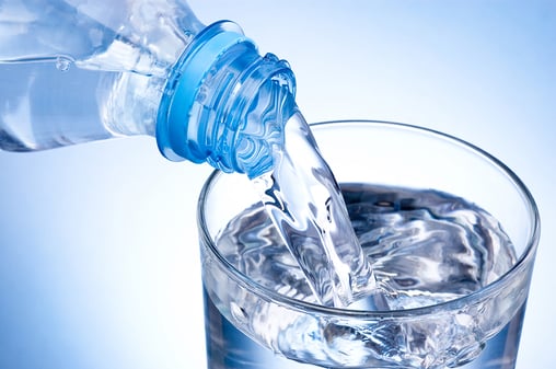 PCS-fluid-monitoring-bottled-water-in-glass