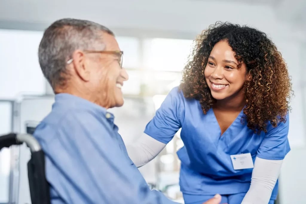 nurse-carer-looking-after-man-in-wheelchair