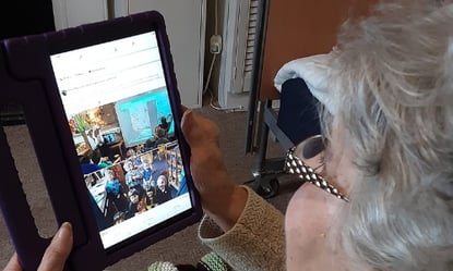 person-centred-software-resident-using-digital-tech-in-care-home